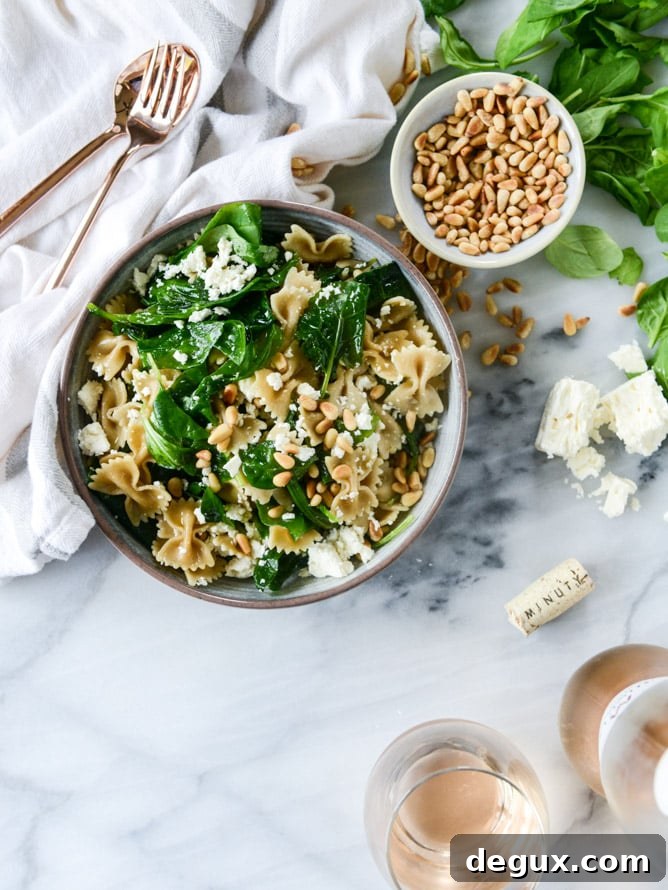 farfalle with marinated feta, arugula and toasted pine nuts I howsweeteats.com