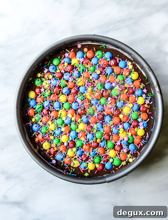 Confetti Ice Cream Fudge Pie with M&M's 5 confetti ice cream fudge pie with M&M'S I howsweeteats.com