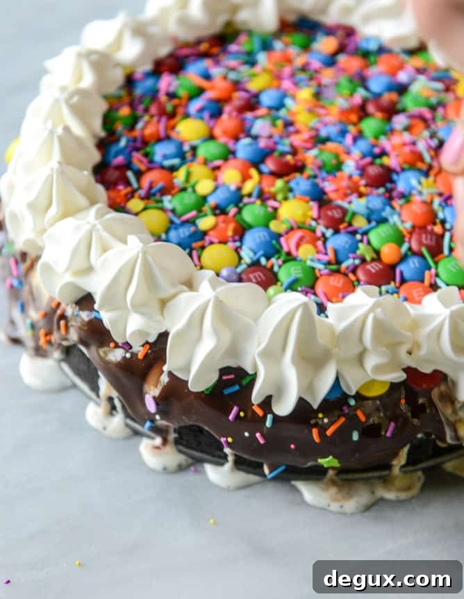 Confetti Ice Cream Fudge Pie with M&M's 7 confetti ice cream fudge pie with M&M'S I howsweeteats.com