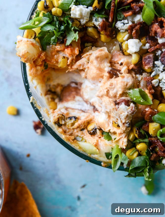 Layered Buffalo Chicken Dip Recipe: Creamy, Cheesy Party Dip 10 layered buffalo chicken dip I howsweeteats.com