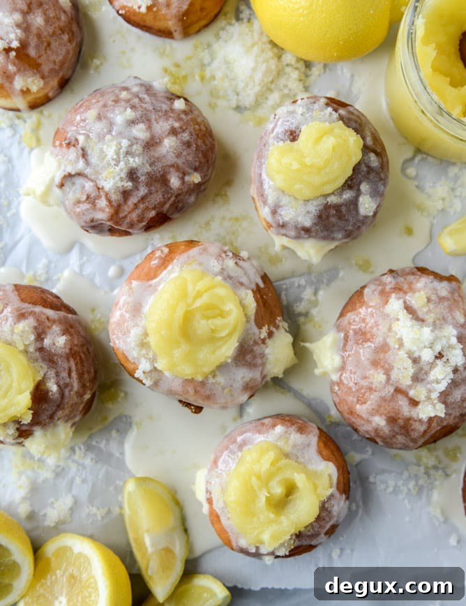 lemon cheesecake doughnuts I howsweeteats.com