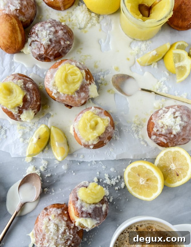 lemon cheesecake doughnuts I howsweeteats.com