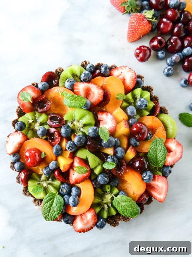 summer fruit tart with chocolate coconut cashew crust I howsweeteats.com