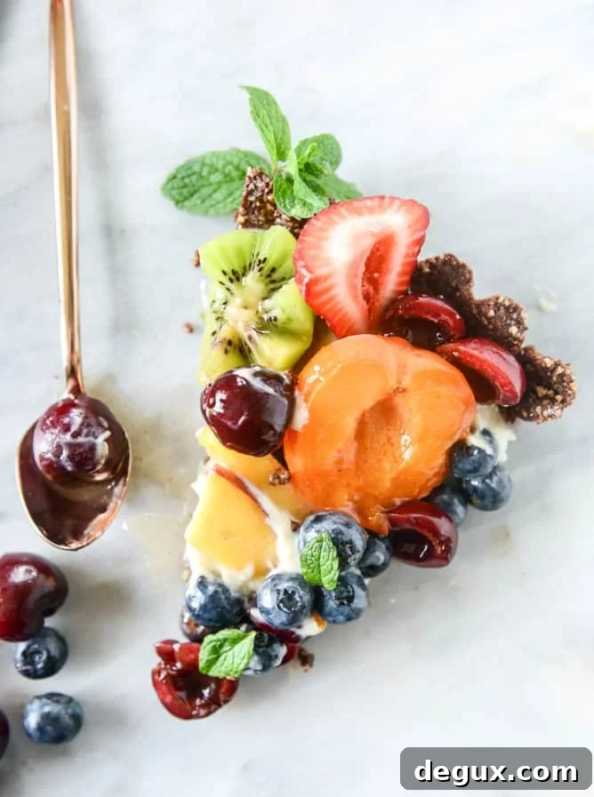 summer fruit tart with chocolate coconut cashew crust I howsweeteats.com