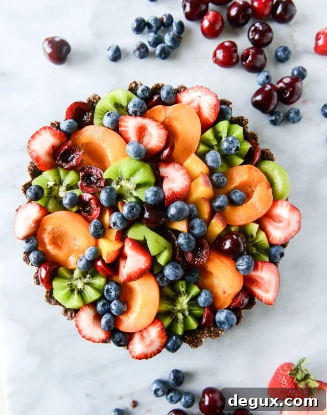 summer fruit tart with chocolate coconut cashew crust I howsweeteats.com