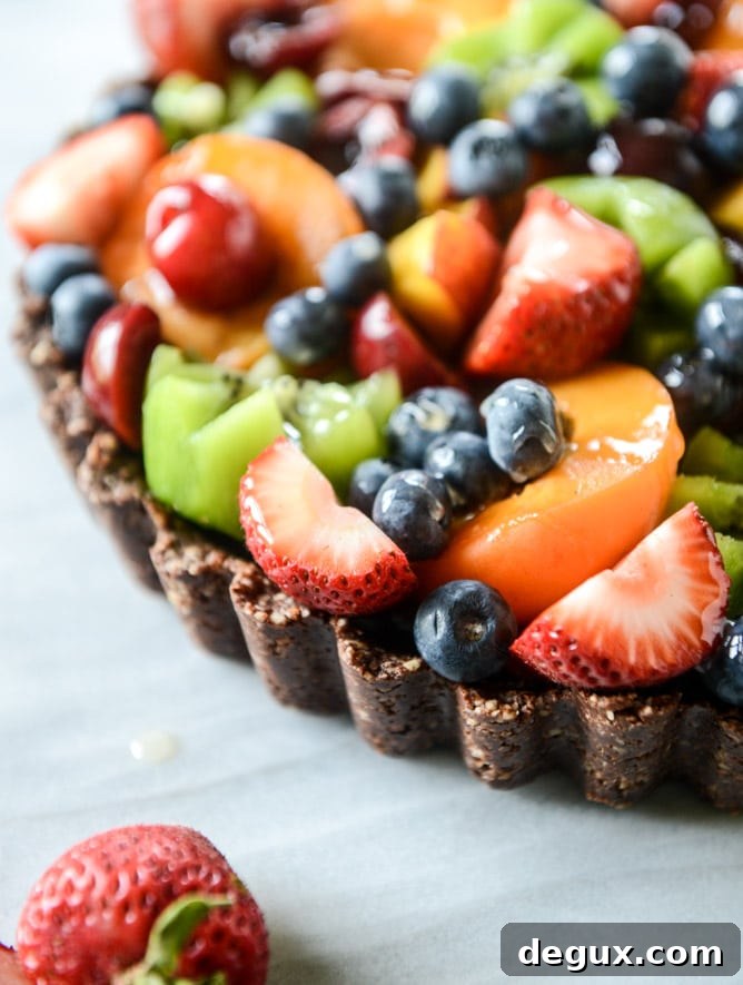 summer fruit tart with chocolate coconut cashew crust I howsweeteats.com
