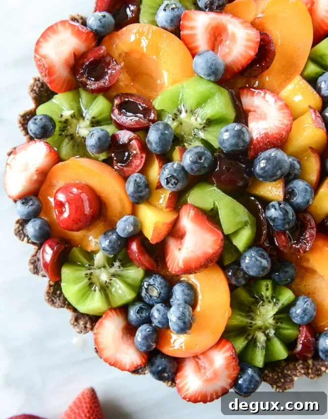 summer fruit tart with chocolate coconut cashew crust I howsweeteats.com