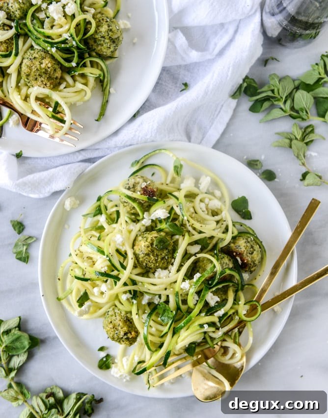Zucchini Noodles with Mini Chicken, Feta & Spinach Meatballs 7 zoodles with mini chicken feta meatballs I howsweeteats.com