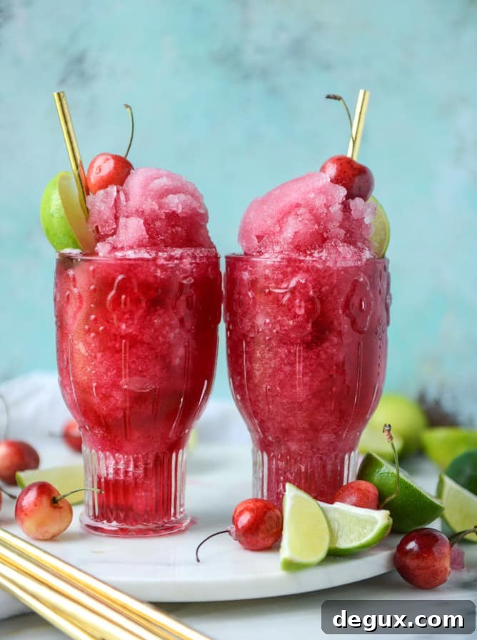 Frozen Cherry Cosmos Cocktail Recipe & Cocktail Guide 2 frozen cherry cosmo I howsweeteats.com