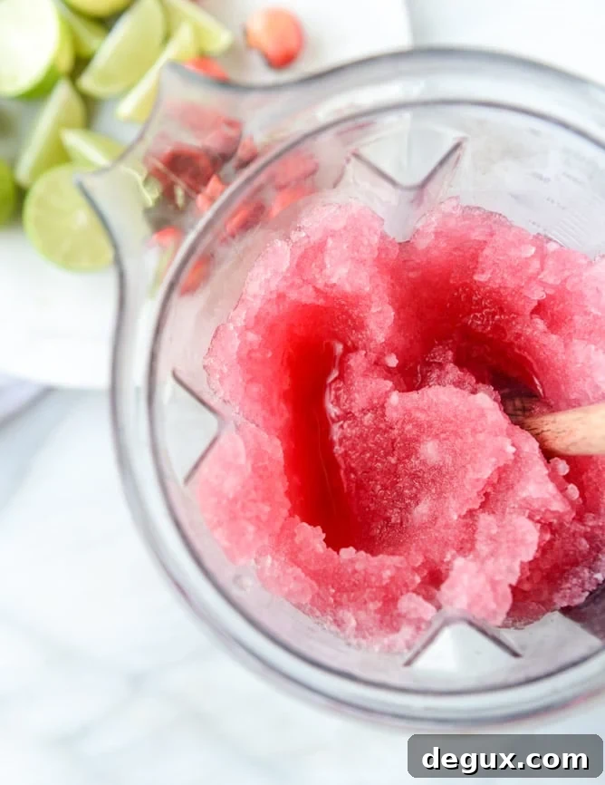 Frozen Cherry Cosmos Cocktail Recipe & Cocktail Guide 4 frozen cherry cosmo I howsweeteats.com