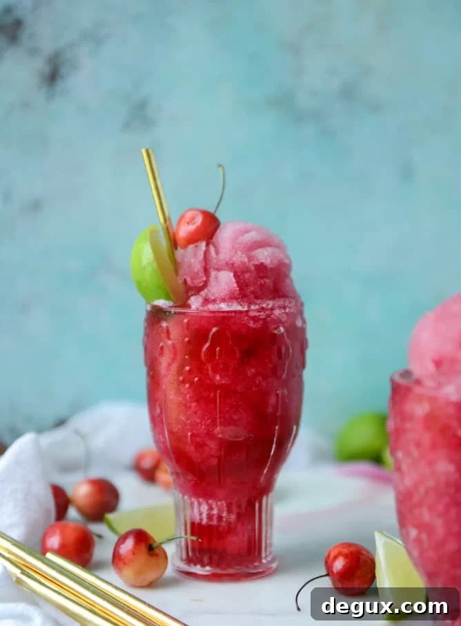 Frozen Cherry Cosmos Cocktail Recipe & Cocktail Guide 6 frozen cherry cosmo I howsweeteats.com