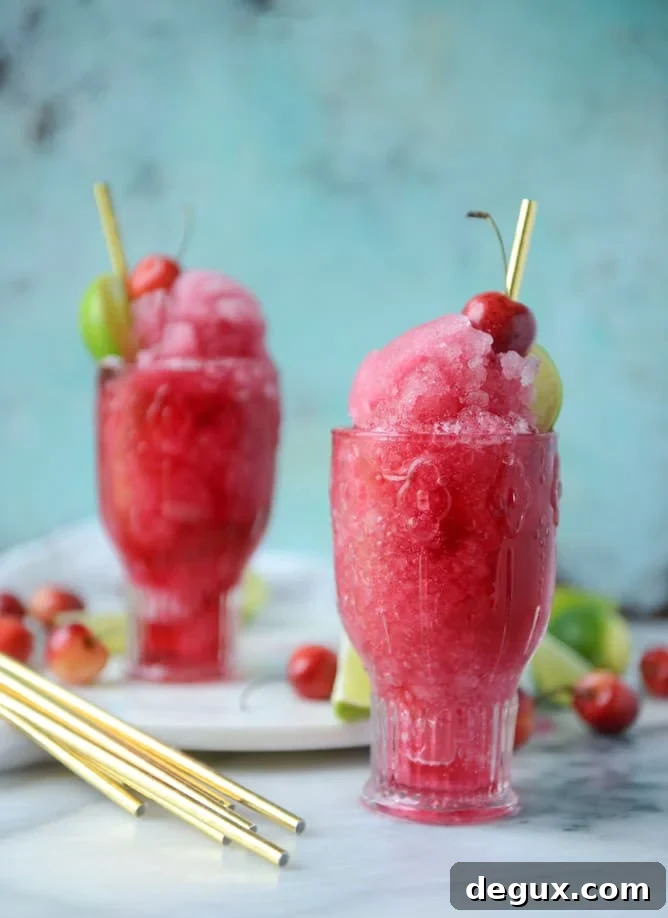 Frozen Cherry Cosmos Cocktail Recipe & Cocktail Guide 9 frozen cherry cosmo I howsweeteats.com
