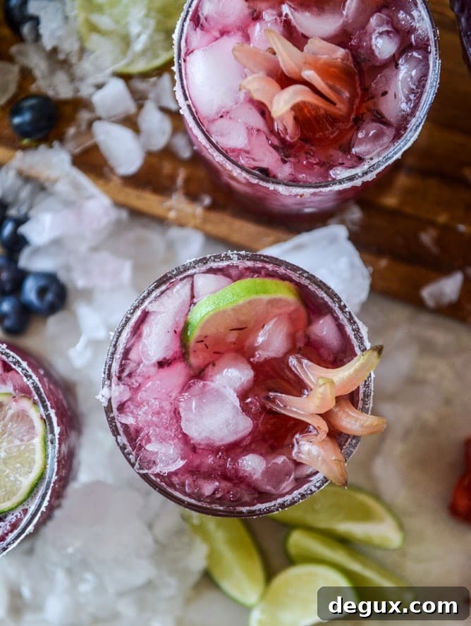 blueberry hibiscus margarita punch I howsweeteats.com