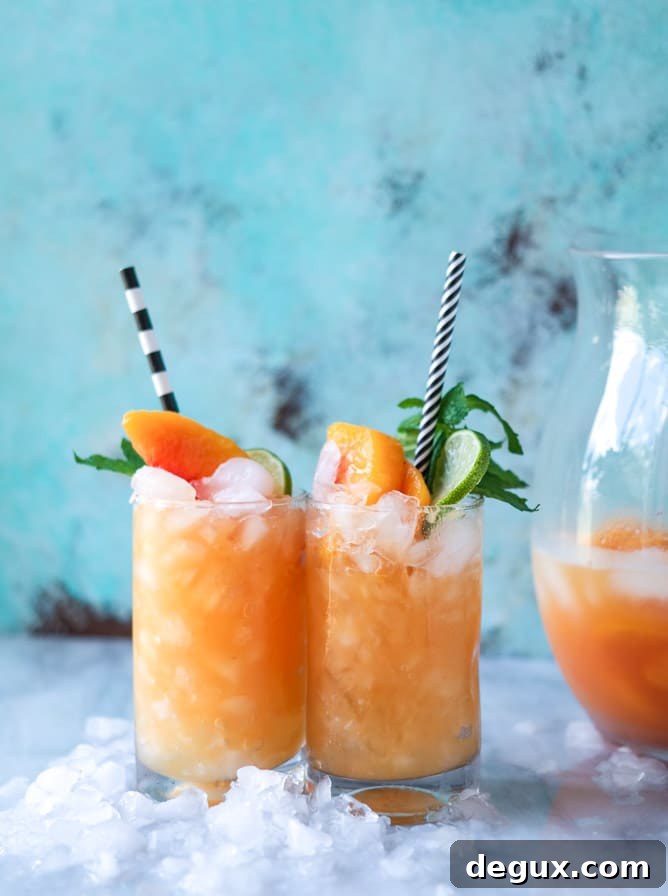 Pineapple and Peach Agua Fresca Recipe for Refreshing Summer Drinks 2 pineapple peach agua fresca I howsweeteats.com