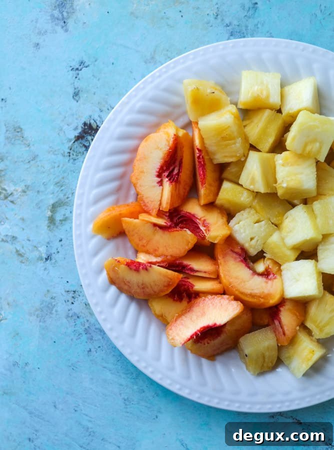 Pineapple and Peach Agua Fresca Recipe for Refreshing Summer Drinks 3 pineapple peach agua fresca I howsweeteats.com