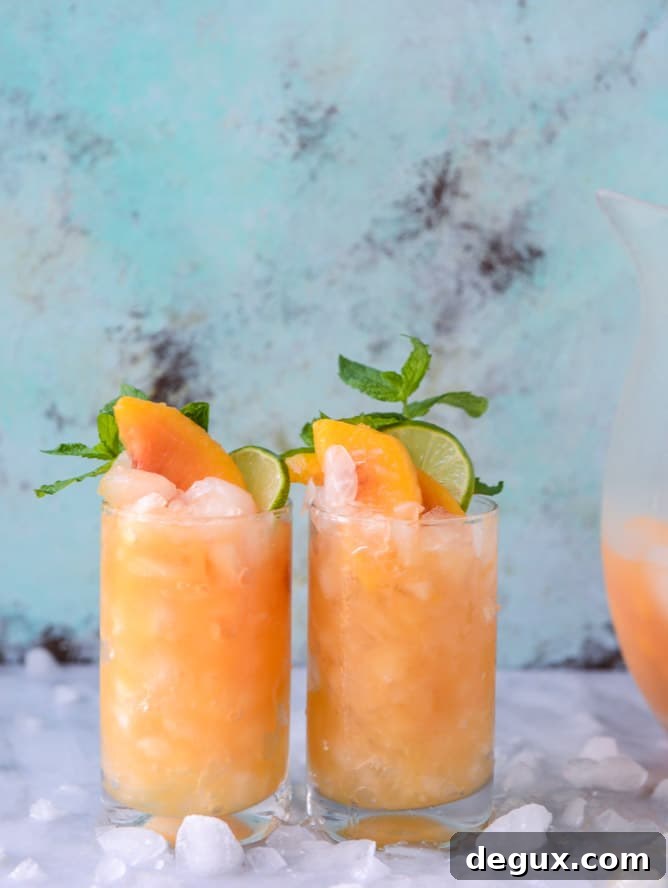 Pineapple and Peach Agua Fresca Recipe for Refreshing Summer Drinks 6 pineapple peach agua fresca I howsweeteats.com
