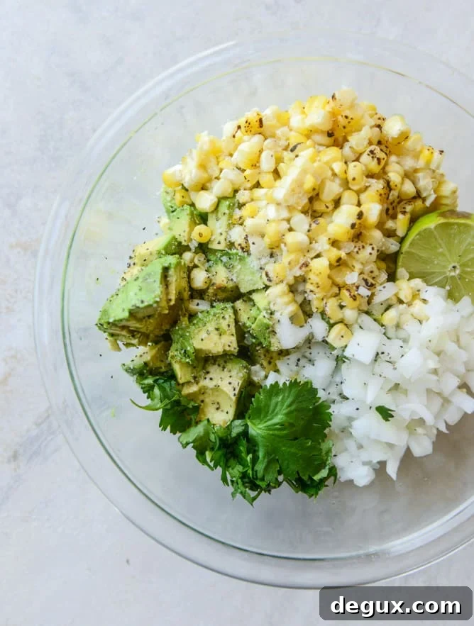chicken tinga tacos with grilled corn guacamole by @howsweeteats I howsweeteats.com