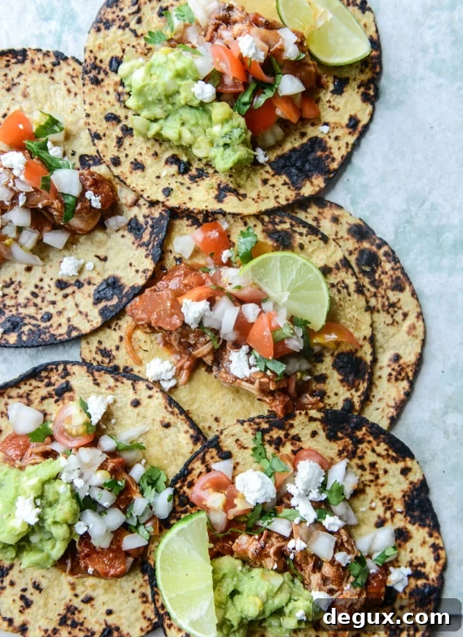 chicken tinga tacos with grilled corn guacamole by @howsweeteats I howsweeteats.com