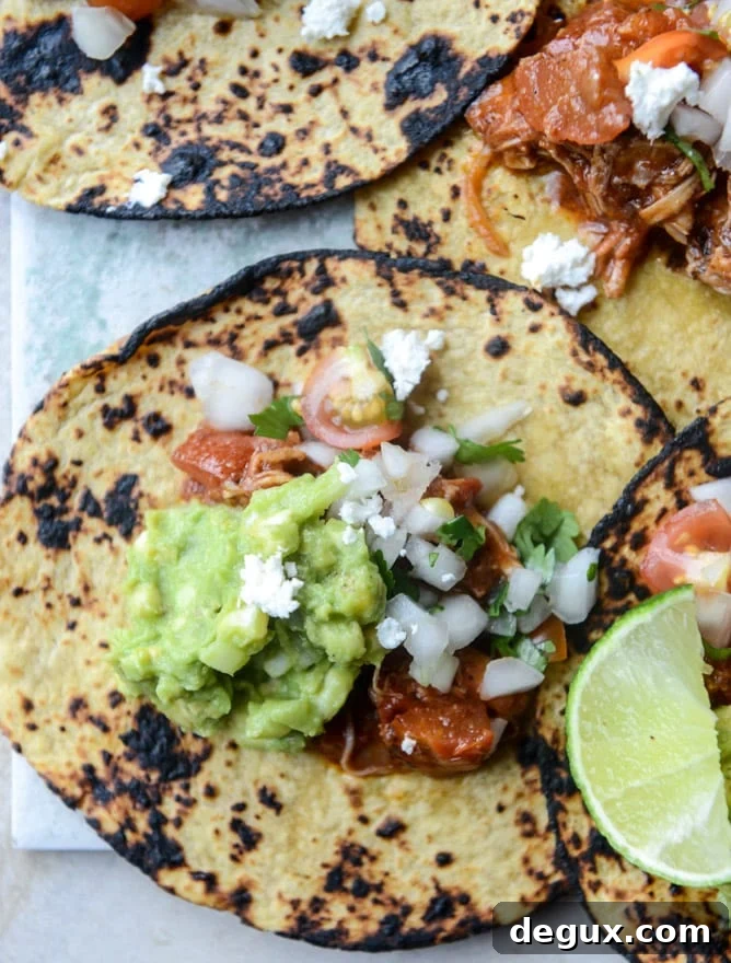 chicken tinga tacos with grilled corn guacamole by @howsweeteats I howsweeteats.com