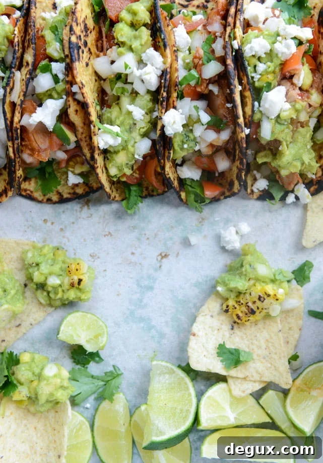 chicken tinga tacos with grilled corn guacamole by @howsweeteats I howsweeteats.com