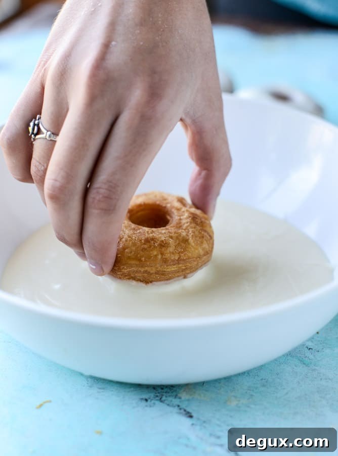 Cookies and Cream Filled Puff Pastry Donuts 3 cookies & cream puff pastry doughnuts by @howsweeteats I howsweeteats.com