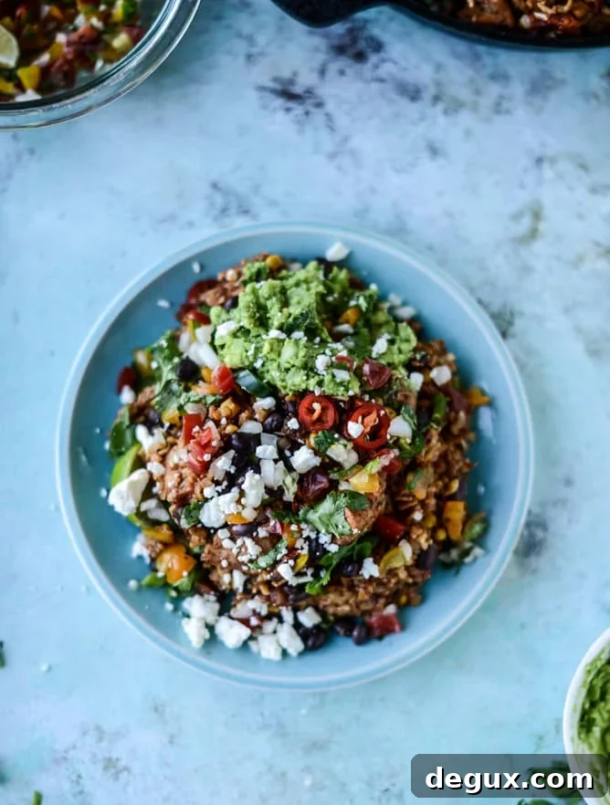 One-Pot Chicken Burrito Rice Skillet: Quick Flavorful Meal 5 one pot burrito chicken and rice I howsweeteats.com