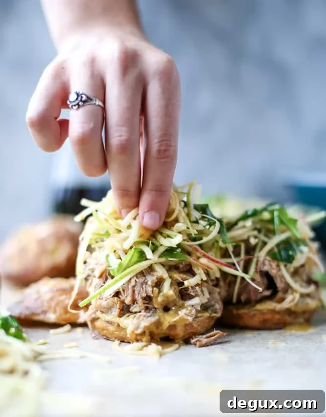smoky pulled pork sandwiches with spiralized apple slaw I howsweeteats.com