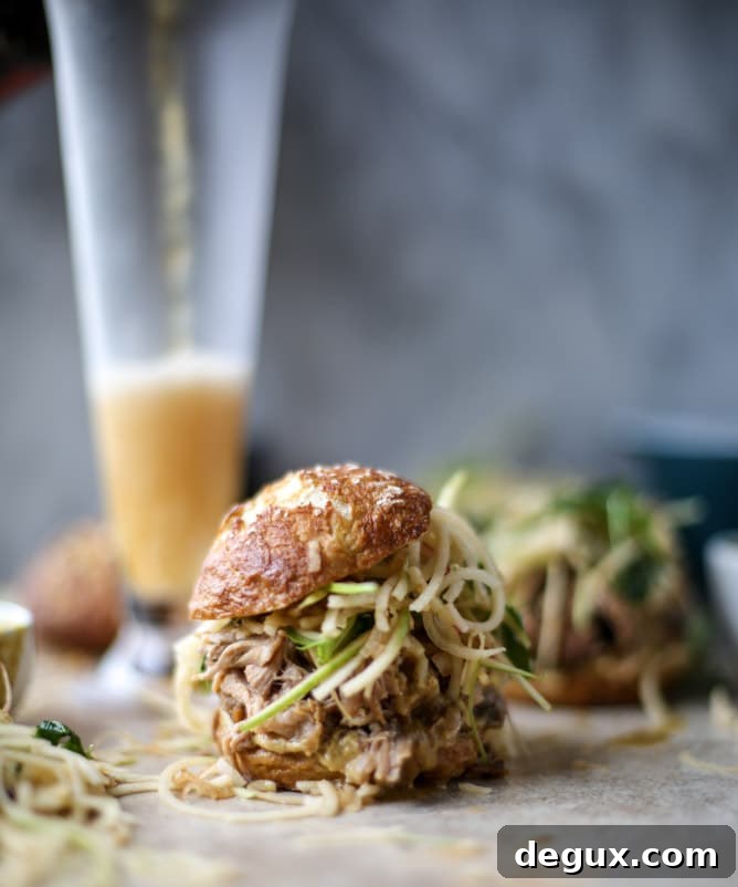 smoky pulled pork sandwiches with spiralized apple slaw I howsweeteats.com