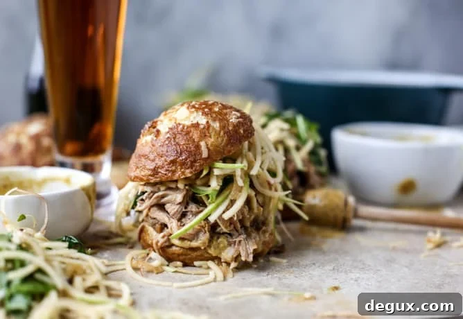 smoky pulled pork sandwiches with spiralized apple slaw I howsweeteats.com