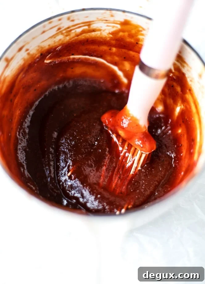 Sticky Apple Cider BBQ Chicken Recipe with Caramelized Glaze 3 apple cider BBQ chicken I howsweeteats.com
