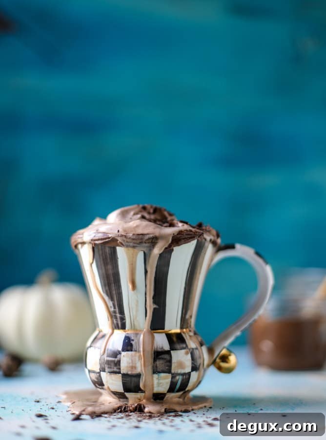 Pumpkin Nutella Hot Chocolate Recipe (Video) 2 pumpkin nutella hot chocolate I howsweeteats.com