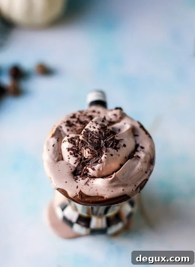 Pumpkin Nutella Hot Chocolate Recipe (Video) 7 pumpkin nutella hot chocolate I howsweeteats.com