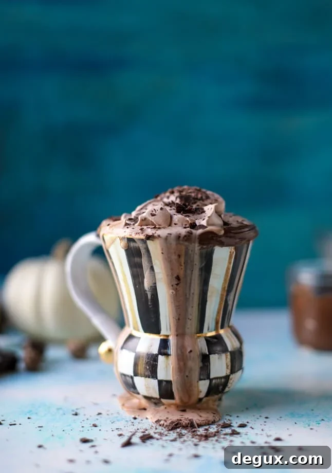 Pumpkin Nutella Hot Chocolate Recipe (Video) 9 pumpkin nutella hot chocolate I howsweeteats.com