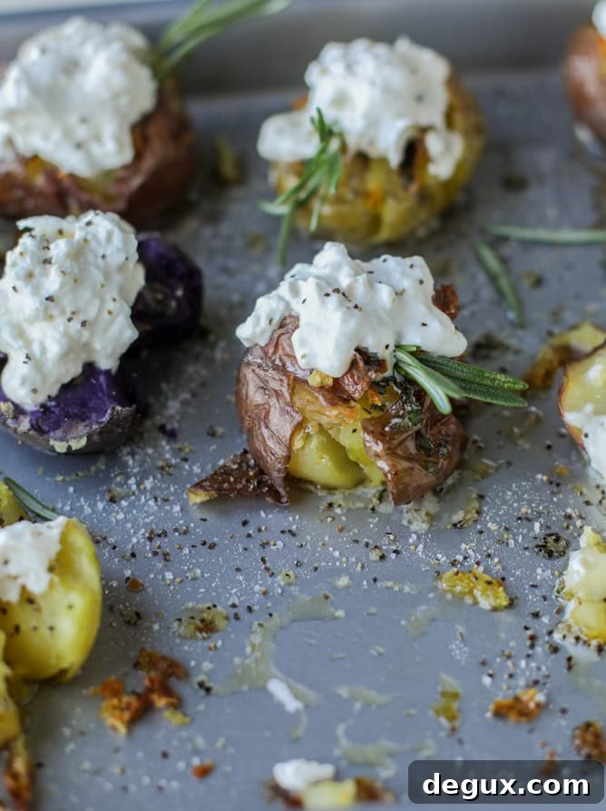 Buttery Rosemary Smashed Potatoes with Creamy Burrata (Video) 3 crispy buttered rosemary smashed potatoes with burrata I howsweeteats.com