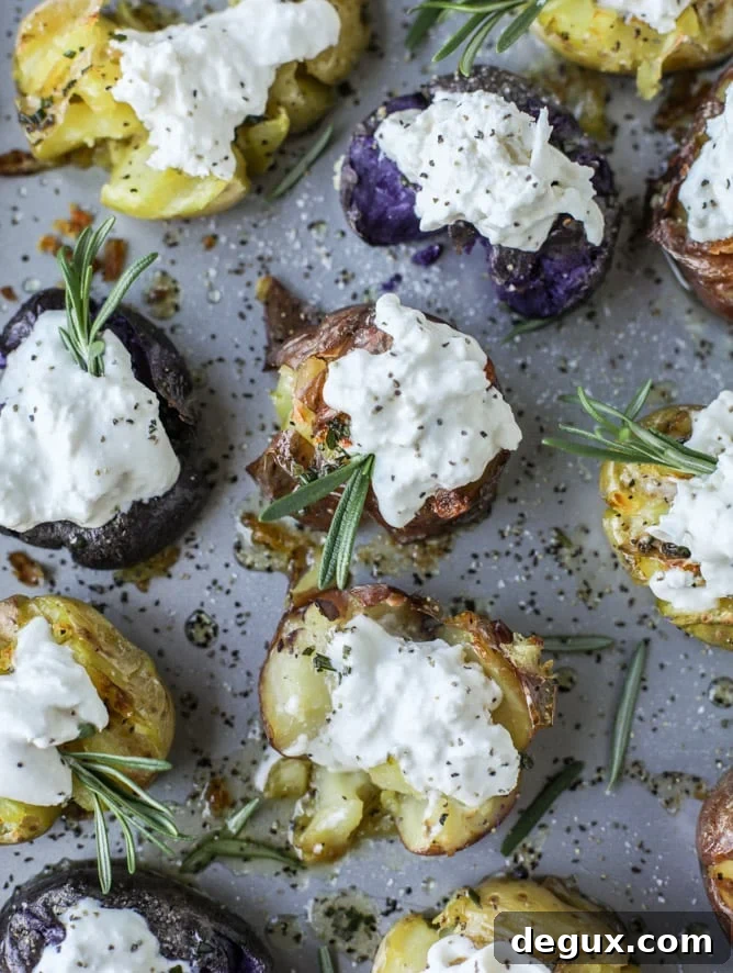 Buttery Rosemary Smashed Potatoes with Creamy Burrata (Video) 8 crispy buttered rosemary smashed potatoes with burrata I howsweeteats.com