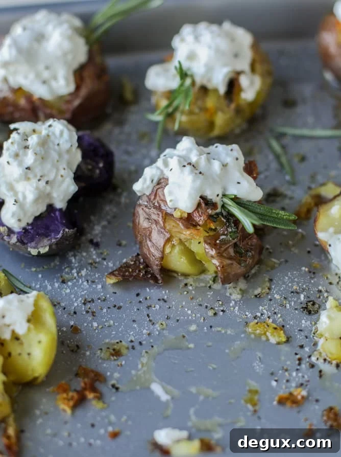 Buttery Rosemary Smashed Potatoes with Creamy Burrata (Video) 10 crispy buttered rosemary smashed potatoes with burrata I howsweeteats.com