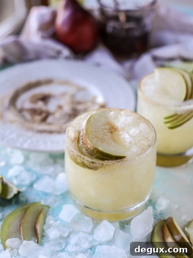 Honey Vanilla Pear Margarita Recipe — Refreshing Fall Cocktail 2 honey vanilla pear margaritas I howsweeteats.com