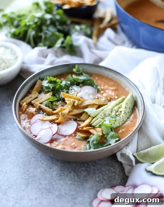 cheesy turkey (or chicken!!) tortilla soup with crispy tortilla strips I howsweeteats.com 