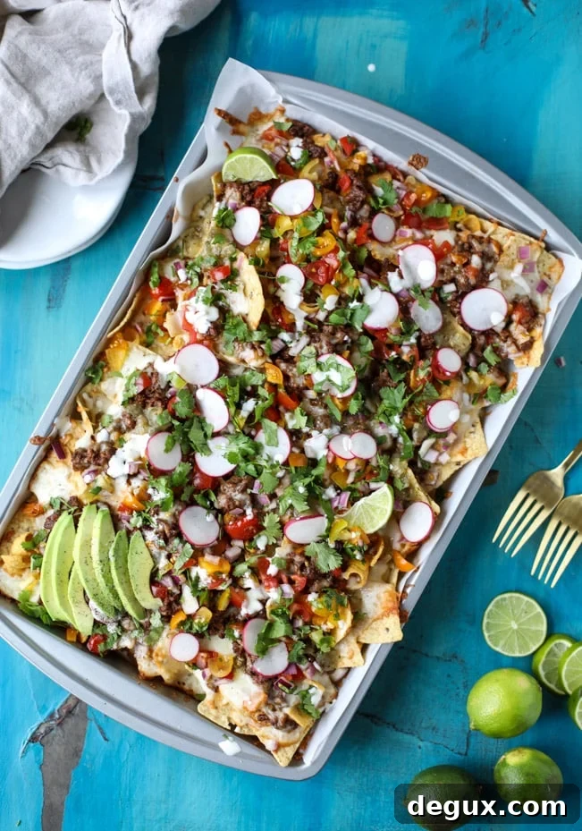 Sheet Pan Green Chile Beef Nachos Recipe 2 sheet pan green chile nachos I howsweeteats.com