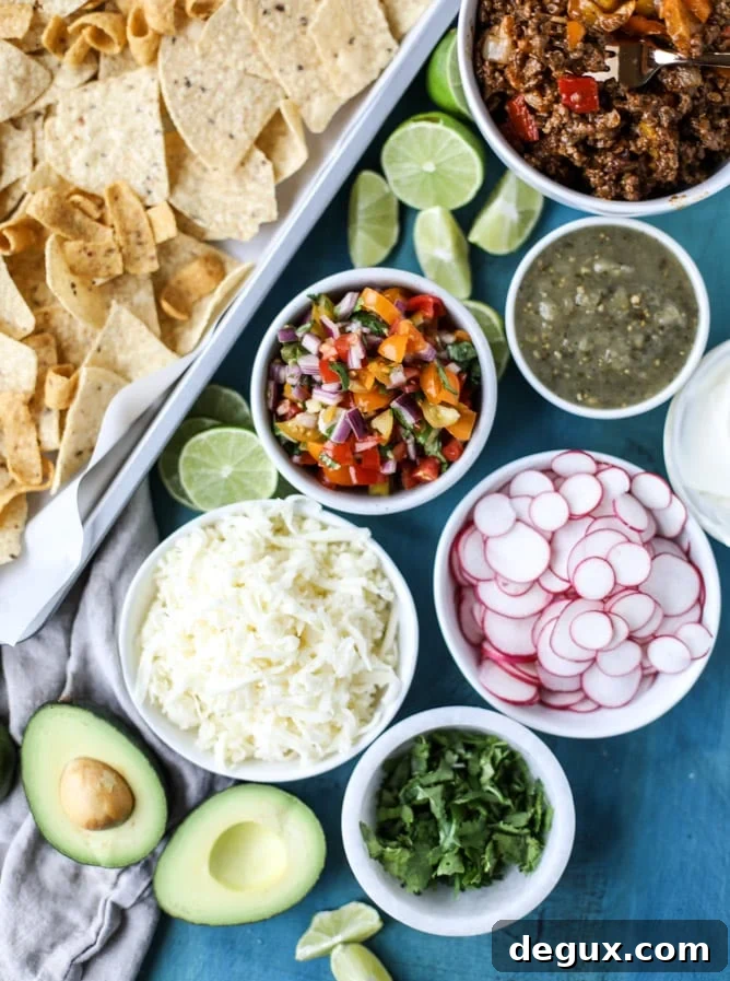 Sheet Pan Green Chile Beef Nachos Recipe 3 sheet pan green chile nachos I howsweeteats.com