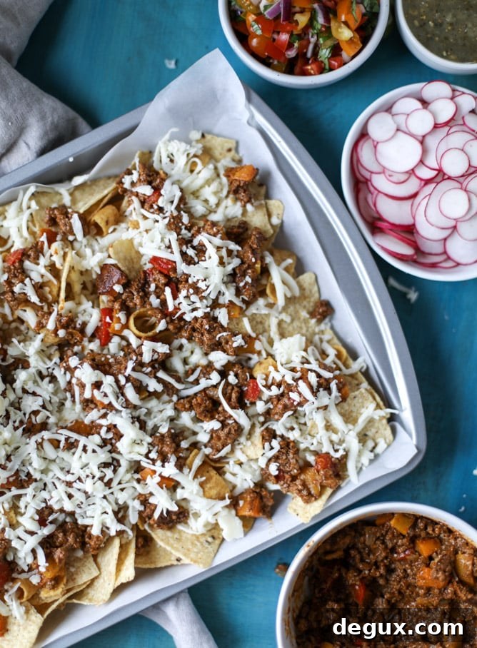 Sheet Pan Green Chile Beef Nachos Recipe 4 sheet pan green chile nachos I howsweeteats.com