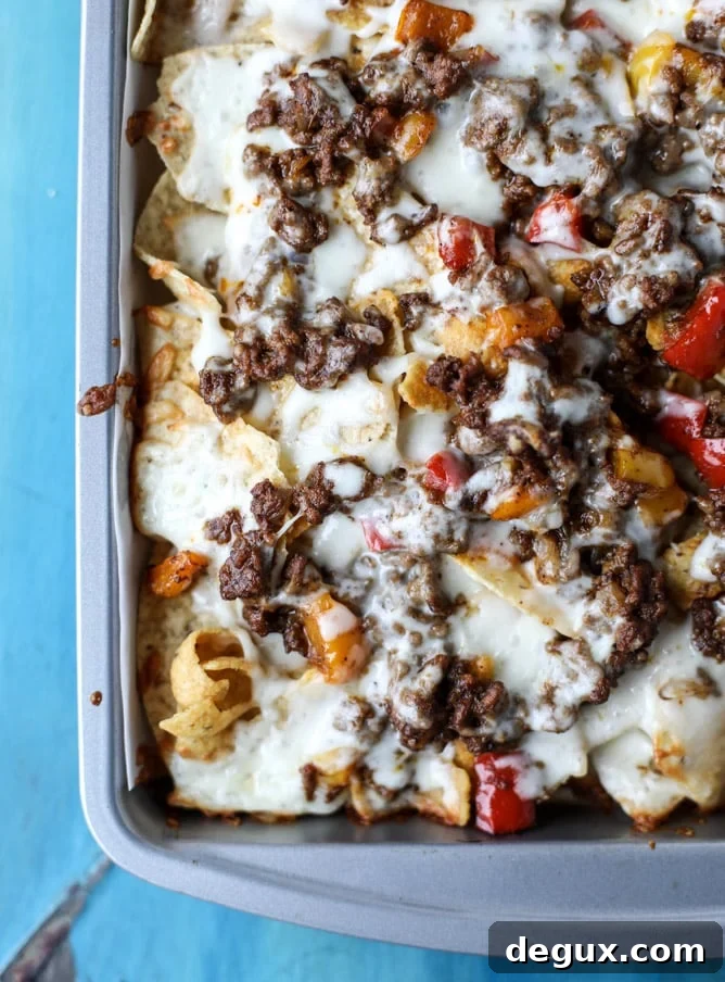 Sheet Pan Green Chile Beef Nachos Recipe 5 sheet pan green chile nachos I howsweeteats.com