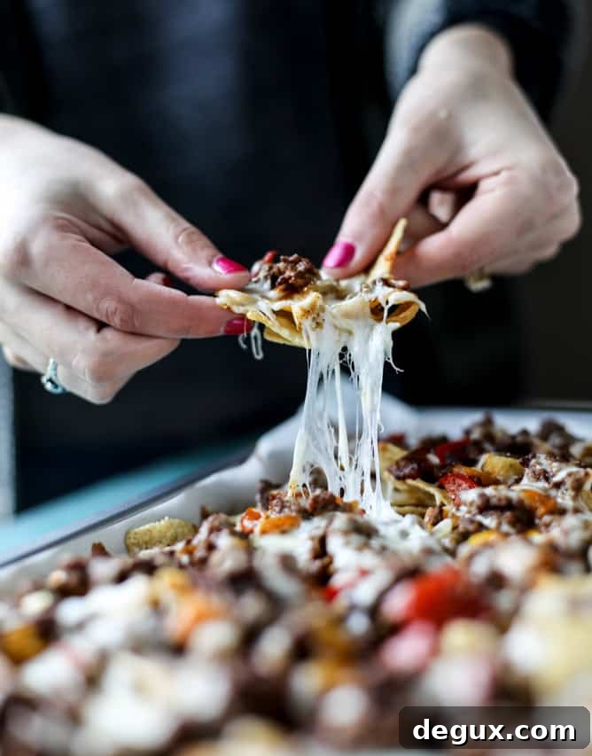 Sheet Pan Green Chile Beef Nachos Recipe 6 sheet pan green chile nachos I howsweeteats.com