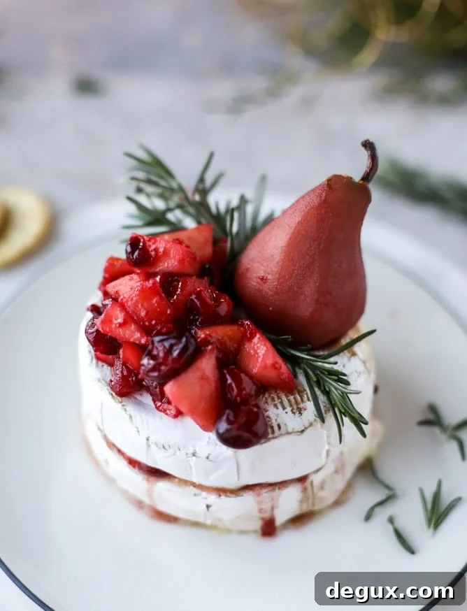 Caramelized Winter Fruit–Stuffed Brie with Pinot-Poached Pear (Video) 2 winter fruit stuffed brie with a pinot poached pear