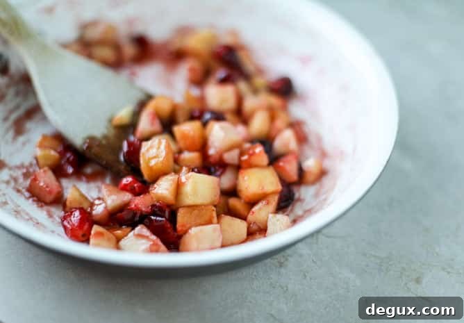 Caramelized Winter Fruit–Stuffed Brie with Pinot-Poached Pear (Video) 4 winter fruit stuffed brie with a pinot poached pear