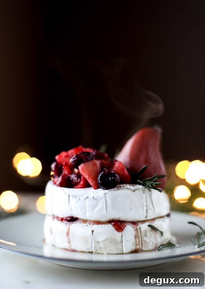 Caramelized Winter Fruit–Stuffed Brie with Pinot-Poached Pear (Video) 5 winter fruit stuffed brie with a pinot poached pear