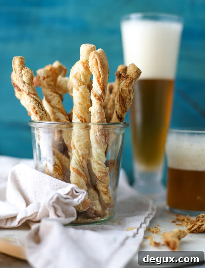 roasted garlic and sharp cheddar cheese straws I howsweeteats.com 