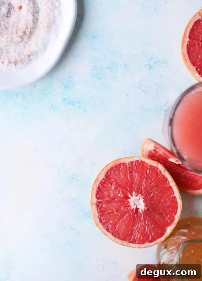 Spicy Chili Salt Pink Grapefruit Margarita Recipe 3 pink grapefruit margaritas with chili salt I howsweeteats.com