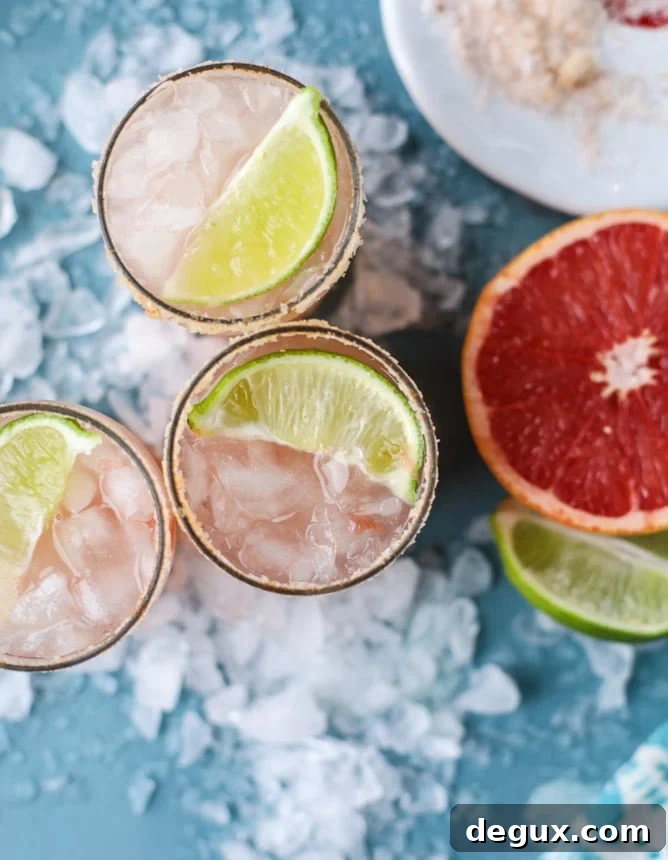Spicy Chili Salt Pink Grapefruit Margarita Recipe 4 pink grapefruit margaritas with chili salt I howsweeteats.com