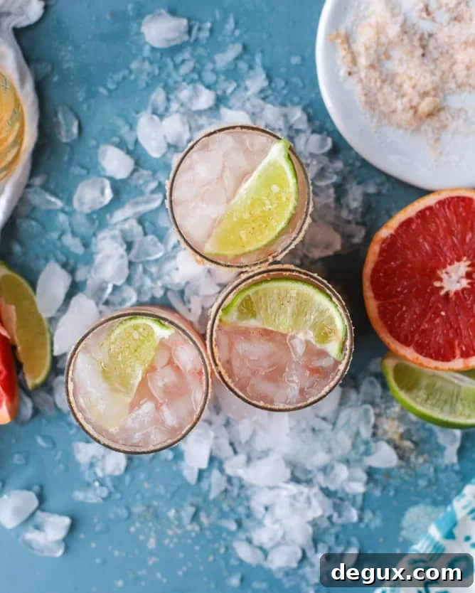 Spicy Chili Salt Pink Grapefruit Margarita Recipe 5 pink grapefruit margaritas with chili salt I howsweeteats.com